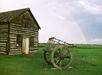 Gingras Trading Post and oxcart with rainbow