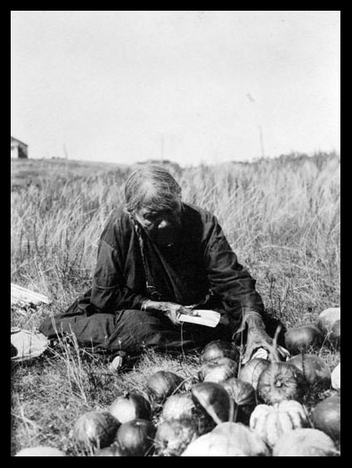 Owl Woman Slicing Squash