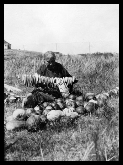 Owl Woman Stringing Squash