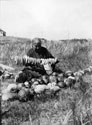 Owl Woman Stringing Squash