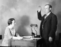 Ole H. Olson taking the Governor's oath of office, 1934