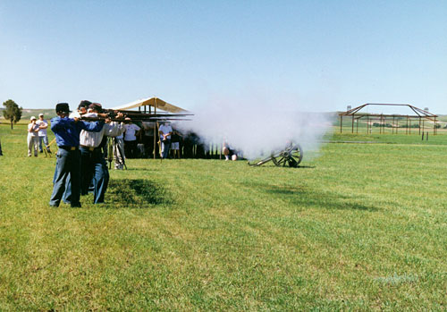 Reenactor Soldiers firing rifles