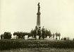 posing in front of monument on dedication day