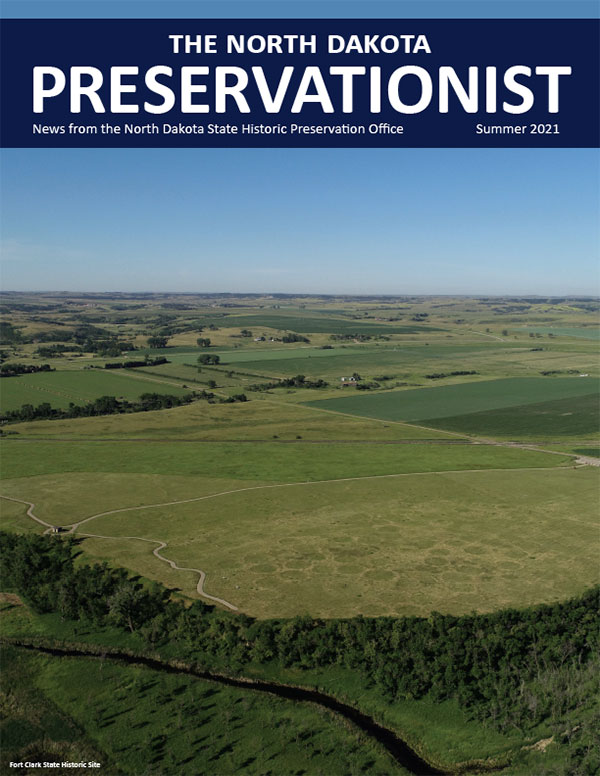 newsletter cover with an aerial view of Fort Clark State Historic Site. Divots are visible in the grass