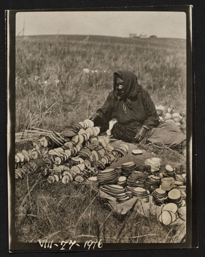 Indian Woman Stringing Squash